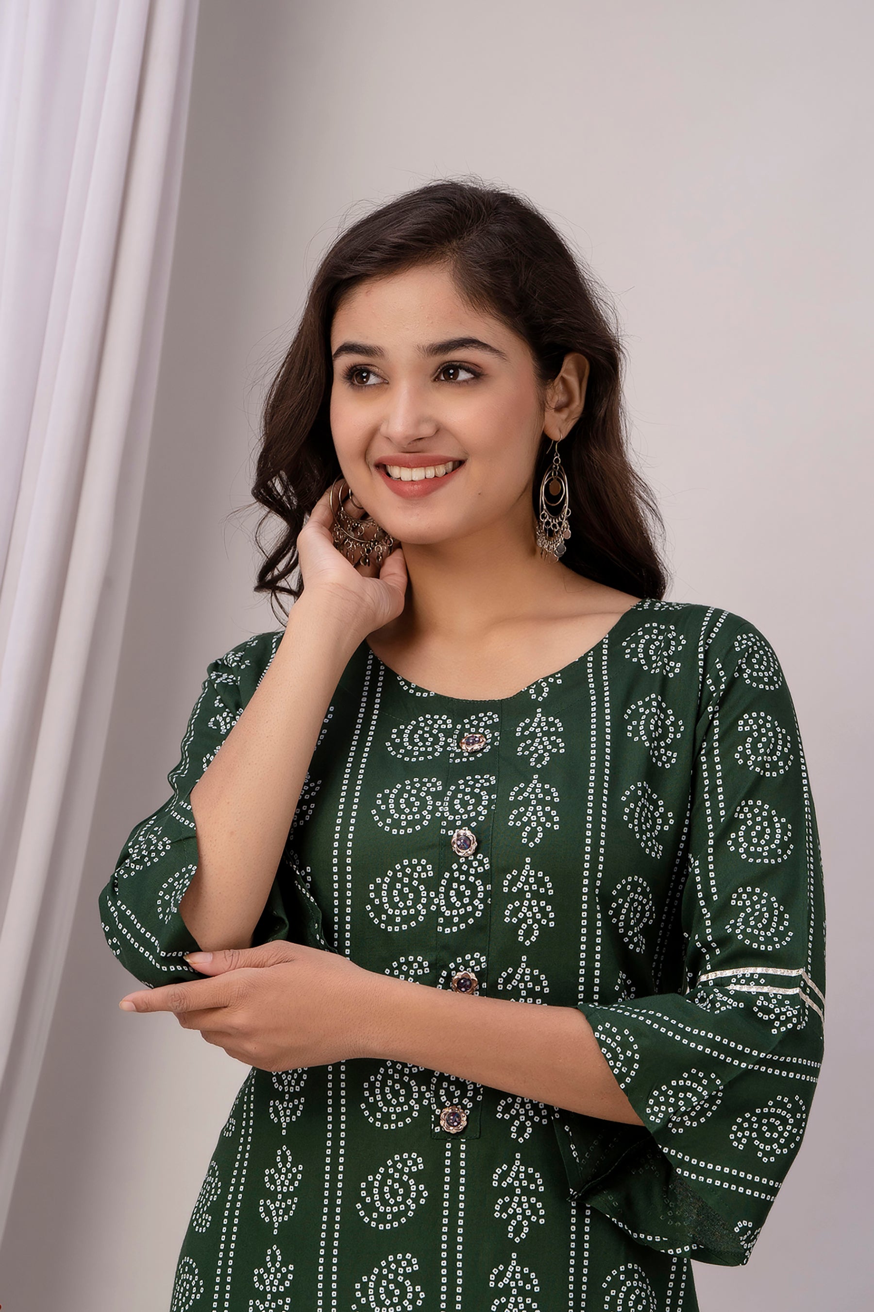 Green Kurti with White Floral Motifs