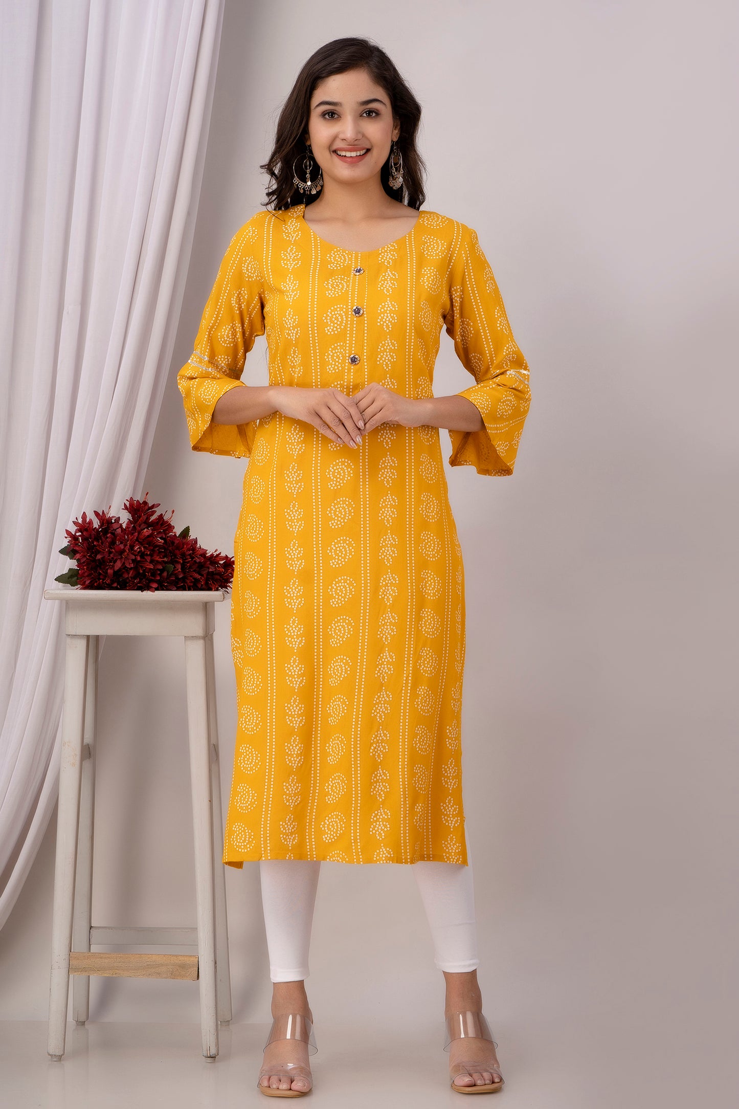 Yellow Kurti with White Floral Motifs