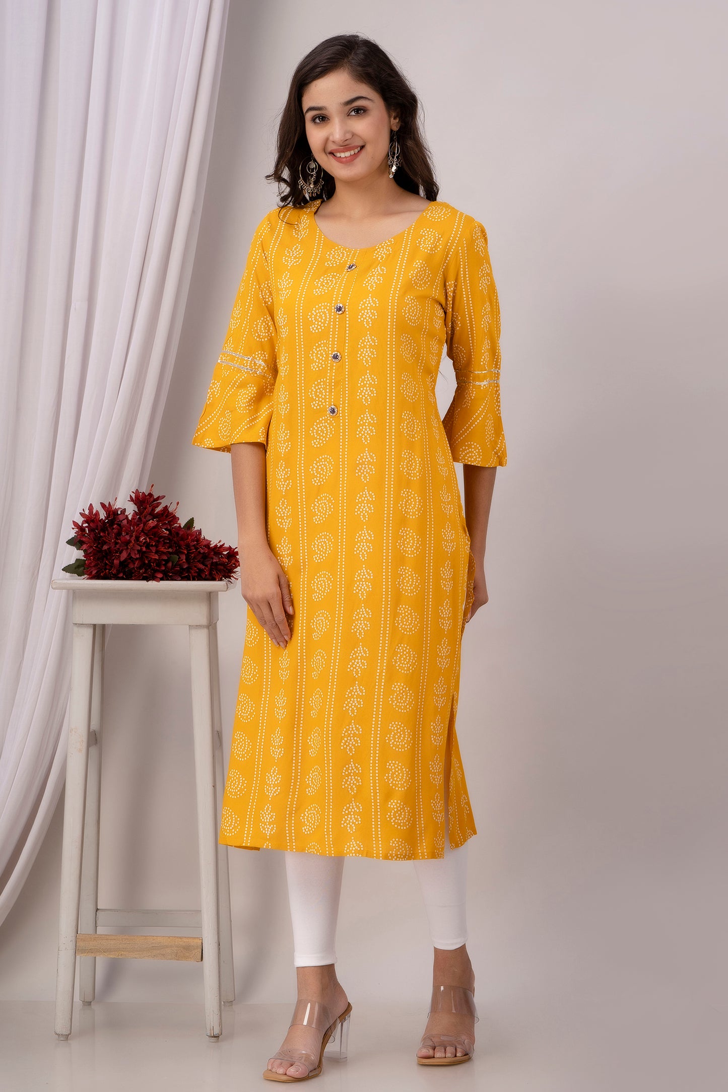 Yellow Kurti with White Floral Motifs