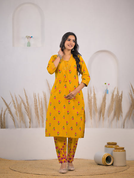 Female wearing floral mustard kurta set
